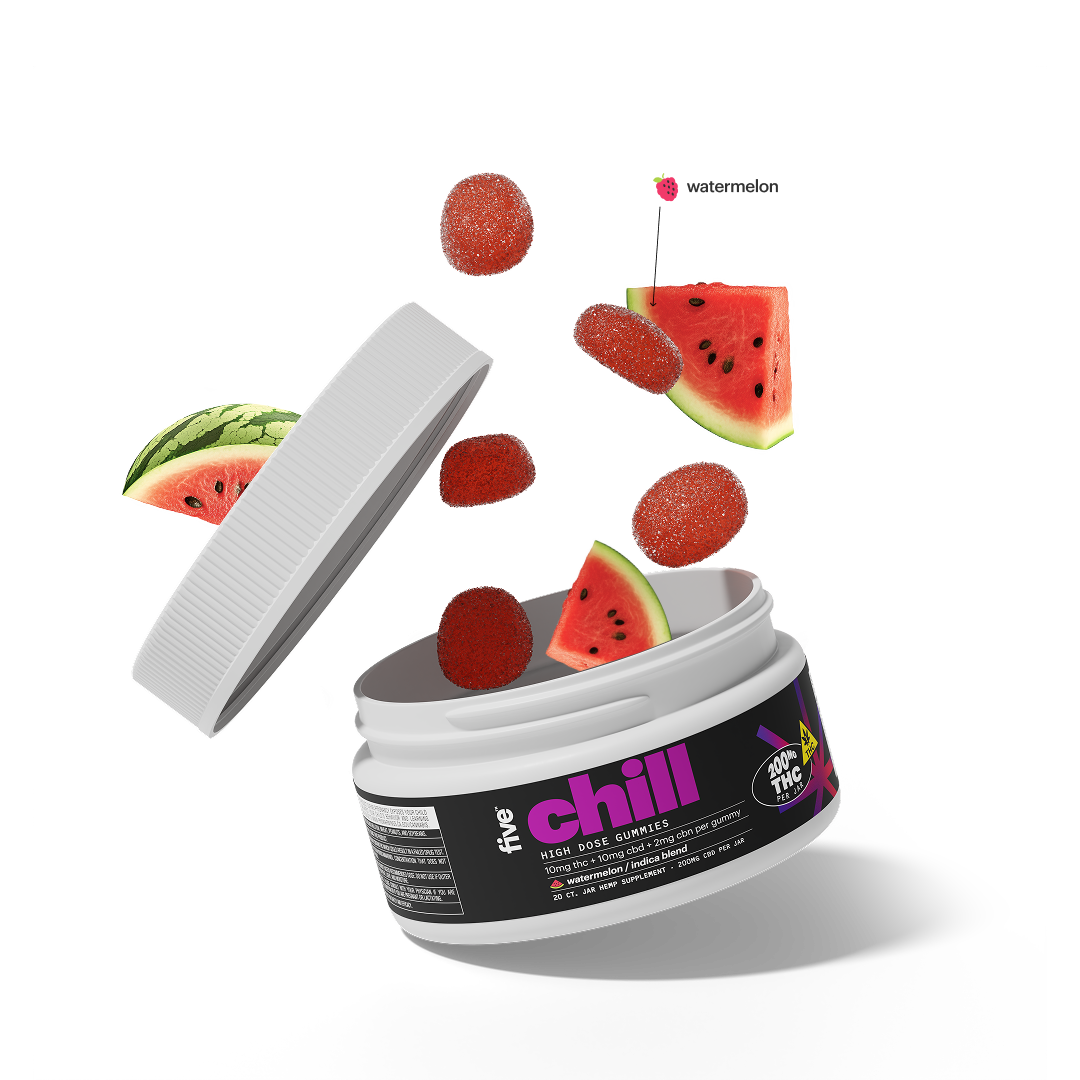 Angled view of Indica Chill 10mg THC watermelon gummies jar with open lid, sugared gummies and watermelon slices on black