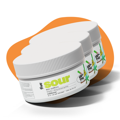Angled view of three Five CBD Sour gummy jars showing sour label, 5mg THC, 25mg CBD per gummy, and 100mg THC jar badge on orange background